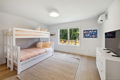Set in the privacy of Hither Woods, this six bedroom, four and a - photo 24