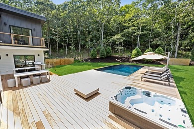 Set in the privacy of Hither Woods, this six bedroom, four and a - photo 26