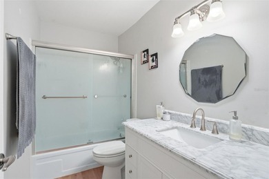 Virtually Staged. Welcome to Belleair Forest - a beautifully - photo 11