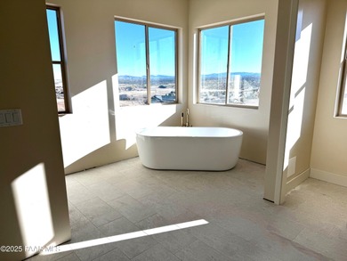 Nestled on 7 aces with sweeping views in Williamson Valley Ranch