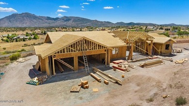 Nestled on 7 aces with sweeping views in Williamson Valley Ranch