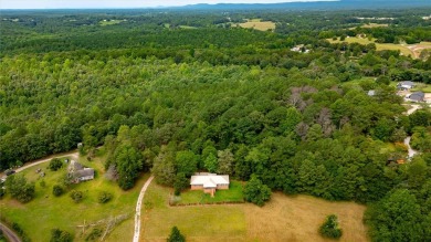 Great home built by a builder for a builder! Tucked away and