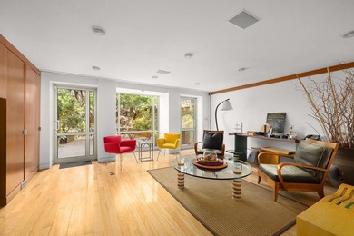 327 East 18th Street is a 20-foot-wide townhouse on one of - photo 11