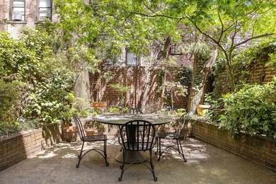 327 East 18th Street is a 20-foot-wide townhouse on one of - photo 14