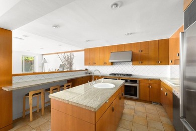 327 East 18th Street is a 20-foot-wide townhouse on one of - photo 15