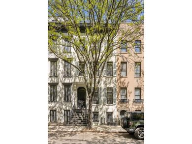 327 East 18th Street is a 20-foot-wide townhouse on one of - photo 17