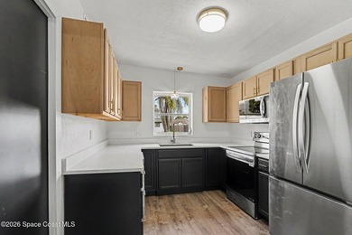 This gem is a must see! Situated on an oversized corner lot with - photo 12