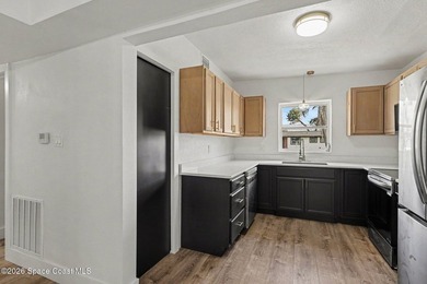 This gem is a must see! Situated on an oversized corner lot with - photo 13
