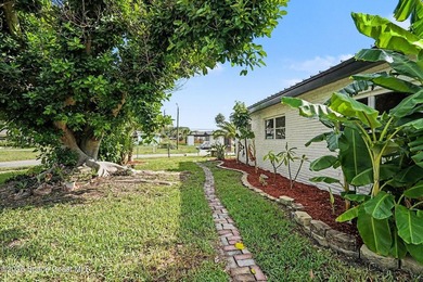 This gem is a must see! Situated on an oversized corner lot with - photo 25