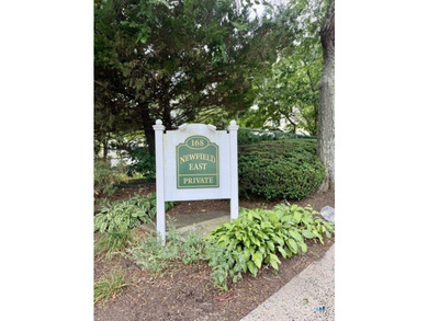 Beautifully updated 2bedroom, 1.5bath unit located in the rear - photo 1