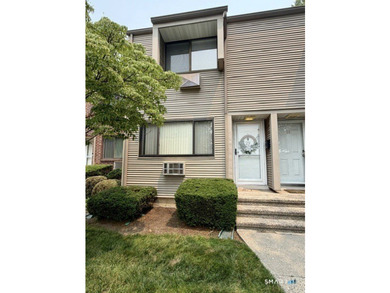 Beautifully updated 2bedroom, 1.5bath unit located in the rear - photo 2