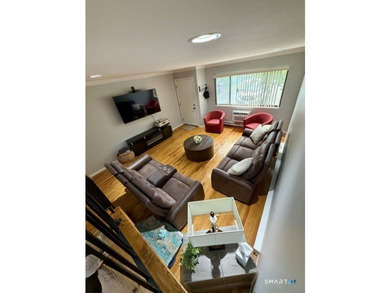 Beautifully updated 2bedroom, 1.5bath unit located in the rear - photo 5