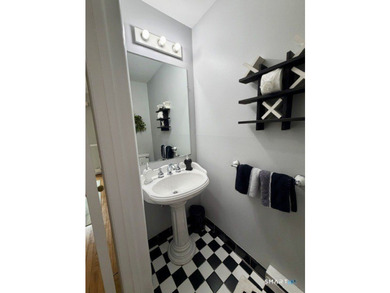 Beautifully updated 2bedroom, 1.5bath unit located in the rear - photo 6