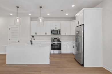 Welcome to this charming cottage-style new construction in the - photo 15