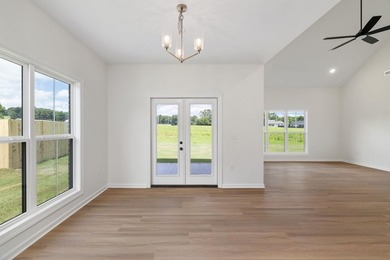 Welcome to this charming cottage-style new construction in the - photo 18