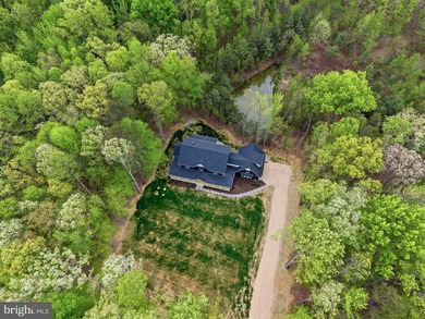 **Listed nearly $50k under appraised value!** This stunning - photo 19