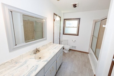 Enjoy the perfect blend of space, updates, and location on this - photo 24