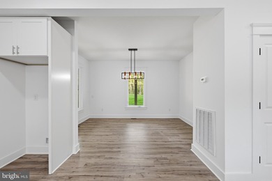 **Listed nearly $50k under appraised value!** This stunning - photo 49