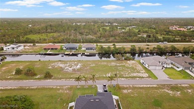 DIRECT GULF ACCESS lot! Seawall and Concrete DOCK in place on - photo 2