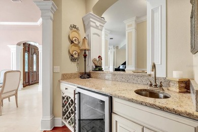 Tucked away in the prestigious Sugar Mill Plantation, this - photo 21