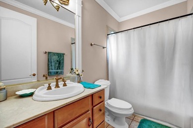Tucked away in the prestigious Sugar Mill Plantation, this - photo 41