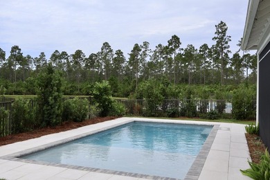 Check out the new pool deck & landscaping! Enjoy an amenity-rich - photo 46