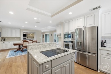Nestled within the prestigious gated community of The Landings - photo 12
