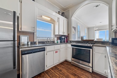 Step into a slice of paradise with this stunning 4-bedroom, 2