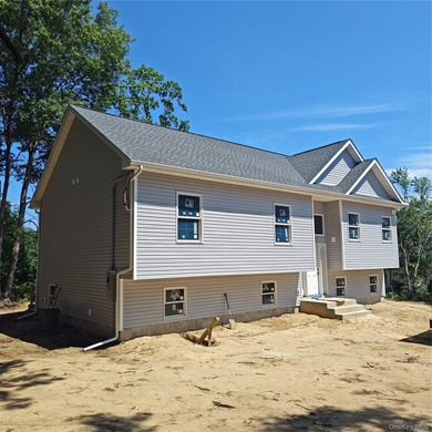 Make this three bedroom, two full bath new construction home - photo 1