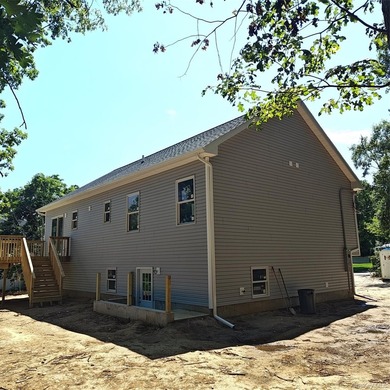 Make this three bedroom, two full bath new construction home - photo 3