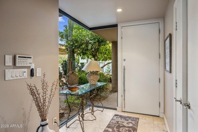 Refined desert living beckons beyond a striking glass gated - photo 13