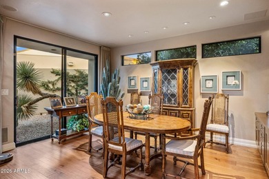 Refined desert living beckons beyond a striking glass gated - photo 15