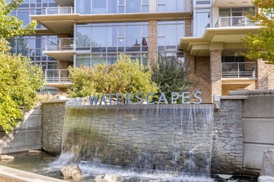 Enjoy sweeping vistas high above downtown Kelowna! This - photo 1