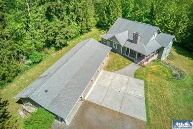 This 5+ acre private estate consists of a 3 bed 2 bath single - photo 2