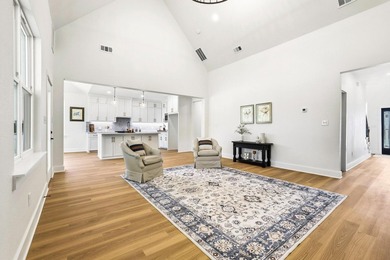 Step inside this stunning home in the gated community of - photo 11