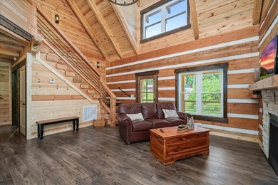 This cabin is a true gem! Offering a new construction log home - photo 11
