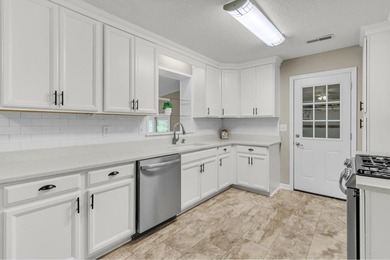 Updated brick ranch in Hanahan! Located in the highly desirable - photo 12