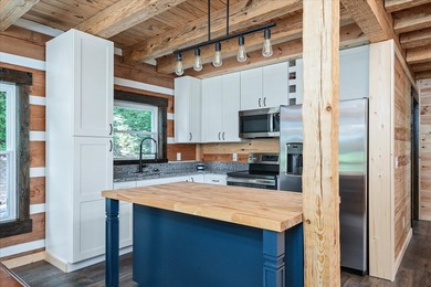 This cabin is a true gem! Offering a new construction log home - photo 17