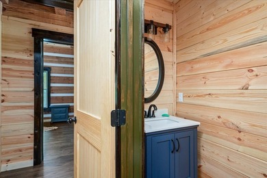 This cabin is a true gem! Offering a new construction log home - photo 21