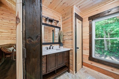 This cabin is a true gem! Offering a new construction log home - photo 31
