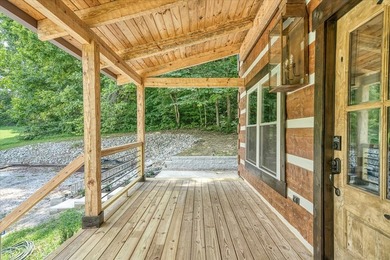 This cabin is a true gem! Offering a new construction log home - photo 35