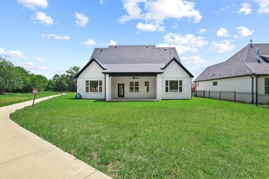 Step inside this stunning home in the gated community of - photo 36