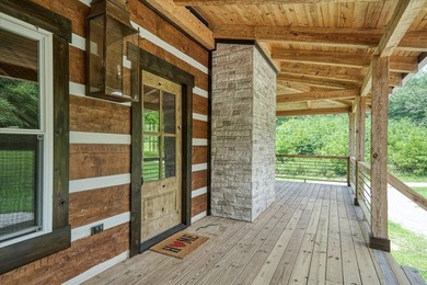 This cabin is a true gem! Offering a new construction log home - photo 36