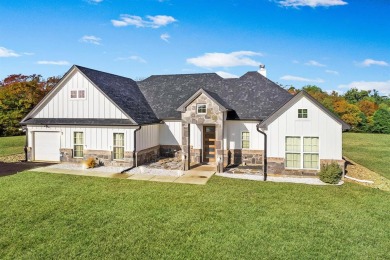 Experience luxury living in this better than new home nestled in - Lake Home For Sale in Pittsburg, Texas