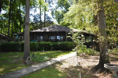 Nestled in the trees with cove and main channel views! - Lake Home For Sale in Ridgeway, South Carolina