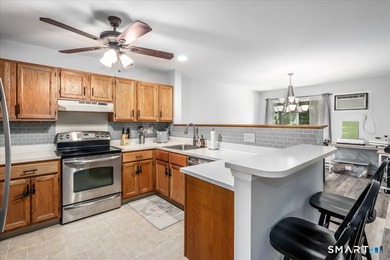 Welcome to this well-maintained and move-in ready condominium - photo 4