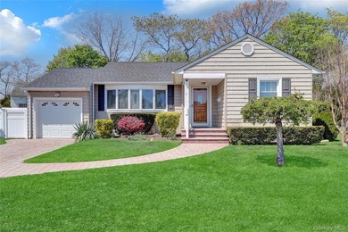 This beautifully maintained ranch offers the perfect blend of - photo 1