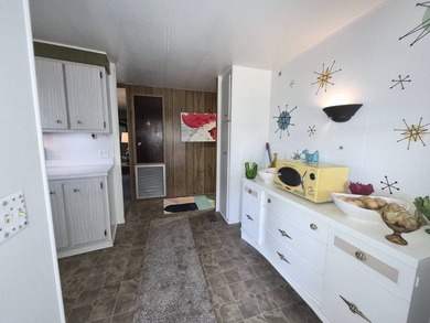 Charming & Updated 1976 A-N-D-E Double-Wide Mobile Home Welcome - photo 5