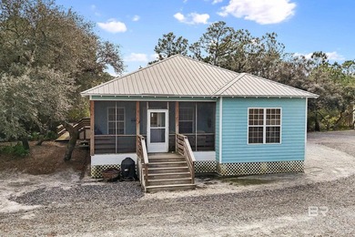 This beautifully maintained 3-bedroom, 2-bath cottage offers the - photo 1