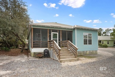 This beautifully maintained 3-bedroom, 2-bath cottage offers the - photo 2